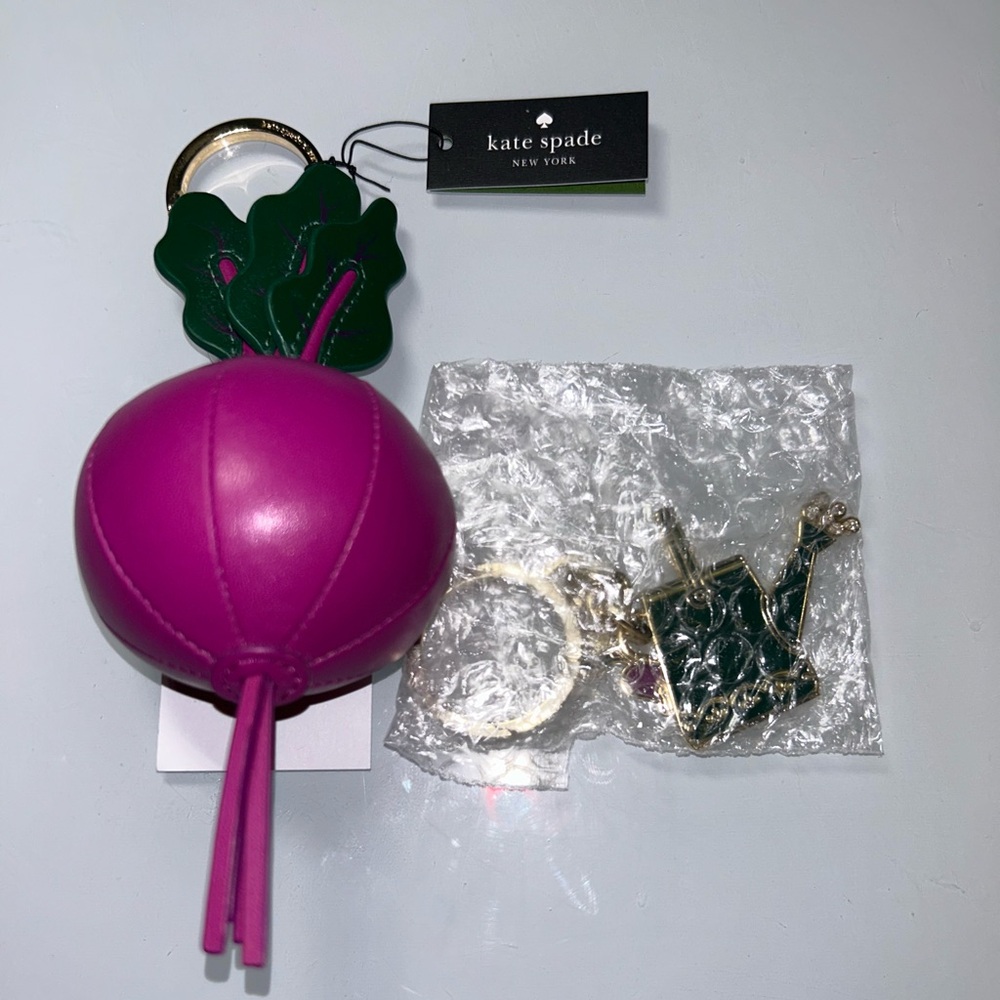 kate spade pink radish keychain with green leaves